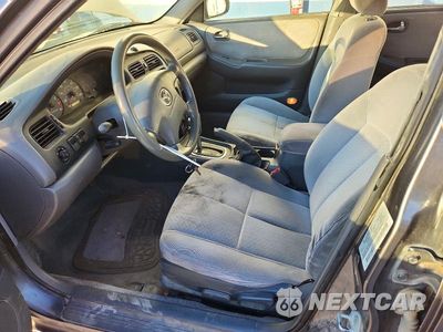 Zdjęcie 7 z 12 samochodu: 2001 MAZDA 626 ES VIN:1YVGF22C115242164 - miniatura