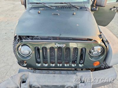 Zdjęcie 11 z 13 samochodu: 2010 JEEP WRANGLER SPORT VIN:1J4GA2D12AL216856 - miniatura