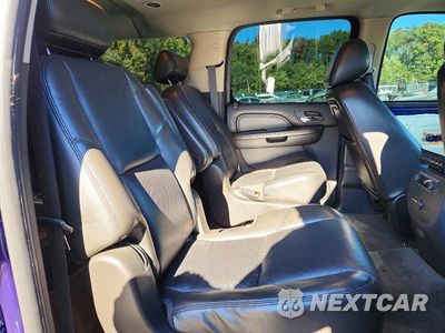 Zdjęcie 11 z 13 samochodu: 2010 GMC YUKON XL DENALI VIN:1GKUKMEFXAR224491 - miniatura