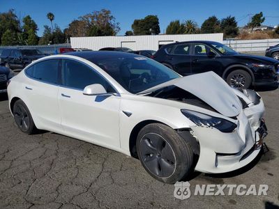 Czwarte zdjęcie samochodu z boku: 2020 TESLA MODEL 3 VIN:5YJ3E1EBXLF637885 - miniatura