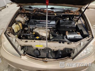 Zdjęcie 11 z 12 samochodu: 2004 TOYOTA CAMRY LE VIN:4T1BE32K44U357945 - miniatura