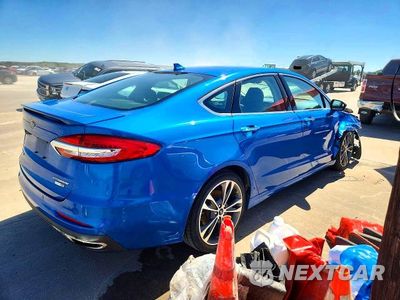 Trzecie zdjęcie samochodu z tyłu: 2020 FORD FUSION TITANIUM VIN:3FA6P0D97LR130625 - miniatura