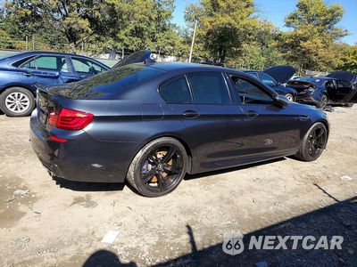 Trzecie zdjęcie samochodu z tyłu: 2013 BMW M5 VIN:WBSFV9C51DC772527 - miniatura