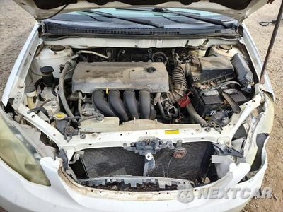 Zdjęcie 11 z 12 samochodu: 2005 TOYOTA COROLLA CE VIN:JTDBR32E452051392 - miniatura