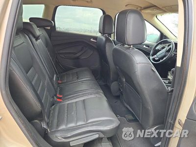 Zdjęcie 10 z 12 samochodu: 2017 FORD ESCAPE TITANIUM VIN:1FMCU9J99HUD59463 - miniatura