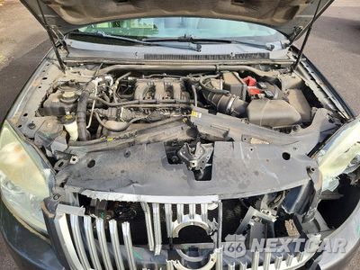 Zdjęcie 11 z 12 samochodu: 2008 MERCURY SABLE PREMIER VIN:1MEHM42W98G608522 - miniatura