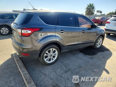 Trzecie zdjęcie samochodu z tyłu: 2017 FORD ESCAPE SE VIN:1FMCU0GDXHUB01556 - miniatura