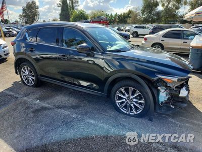 Czwarte zdjęcie samochodu z boku: 2019 MAZDA CX-5 GRAND TOURING VIN:JM3KFADM6K1564282 - miniatura