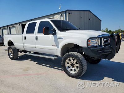 Czwarte zdjęcie samochodu z boku: 2004 FORD F350 SRW SUPER DUTY VIN:1FTSW31P74ED34393 - miniatura