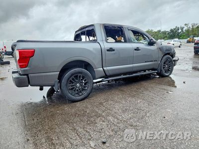 Trzecie zdjęcie samochodu z tyłu: 2018 NISSAN TITAN SV VIN:1N6AA1E62JN530489 - miniatura