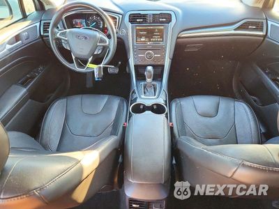 Zdjęcie 8 z 12 samochodu: 2016 FORD FUSION TITANIUM PHEV VIN:3FA6P0SU2GR193614 - miniatura