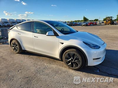 Czwarte zdjęcie samochodu z boku: 2022 TESLA MODEL Y VIN:7SAYGAEE9NF515647 - miniatura