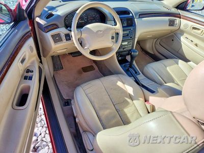 Zdjęcie 8 z 12 samochodu: 1999 TOYOTA CAMRY SOLARA SLE V6 VIN:2T1CF22P3XC254562 - miniatura
