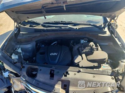 Zdjęcie 12 z 13 samochodu: 2013 HYUNDAI SANTA FE SPORT 2.4L VIN:5XYZT3LB7DG039973 - miniatura
