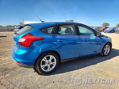 Trzecie zdjęcie samochodu z tyłu: 2014 FORD FOCUS SE VIN:1FADP3K2XEL117982 - miniatura