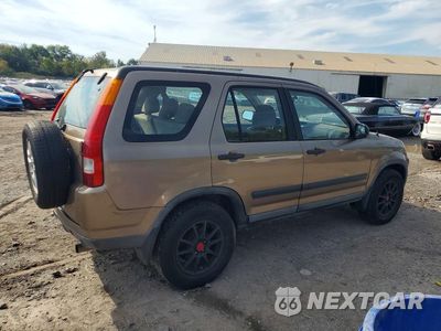 Trzecie zdjęcie samochodu z tyłu: 2004 HONDA CR-V LX VIN:SHSRD78434U235133 - miniatura