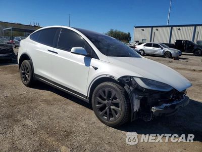 Czwarte zdjęcie samochodu z boku: 2022 TESLA MODEL X VIN:7SAXCDE5XNF343976 - miniatura