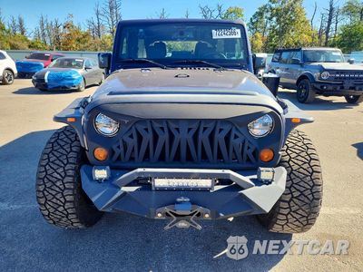 Piąte zdjęcie samochodu w środku: 2013 JEEP WRANGLER UNLIMITED SPORT VIN:1C4HJWDGXDL617047 - miniatura