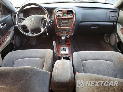 Zdjęcie 8 z 13 samochodu: 2003 HYUNDAI SONATA GLS VIN:KMHWF35H03A816399 - miniatura
