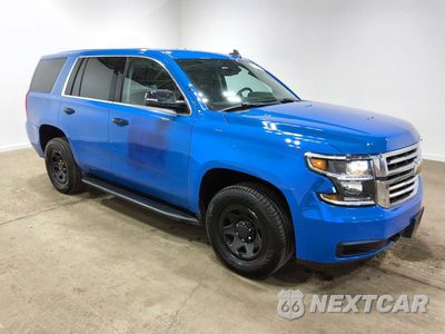 Czwarte zdjęcie samochodu z boku: 2020 CHEVROLET TAHOE POLICE VIN:1GNSKDECXLR246252 - miniatura