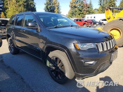 Czwarte zdjęcie samochodu z boku: 2020 JEEP GRAND CHEROKEE LAREDO VIN:1C4RJFAG8LC341099 - miniatura