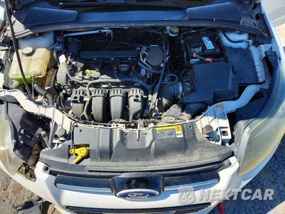 Zdjęcie 11 z 13 samochodu: 2013 FORD FOCUS TITANIUM VIN:1FADP3J21DL116879 - miniatura