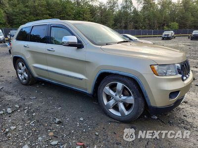 Czwarte zdjęcie samochodu z boku: 2011 JEEP GRAND CHEROKEE OVERLAND VIN:1J4RR6GT8BC605637 - miniatura