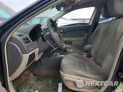 Zdjęcie 7 z 13 samochodu: 2010 FORD FUSION S VIN:3FAHP0GA1AR402436 - miniatura