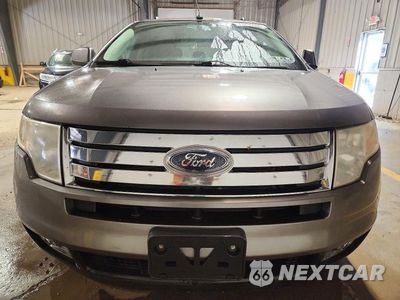 Piąte zdjęcie samochodu w środku: 2010 FORD EDGE SEL VIN:2FMDK4JC7ABA72708 - miniatura