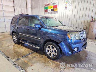 Czwarte zdjęcie samochodu z boku: 2011 HONDA PILOT TOURING VIN:5FNYF4H99BB011076 - miniatura