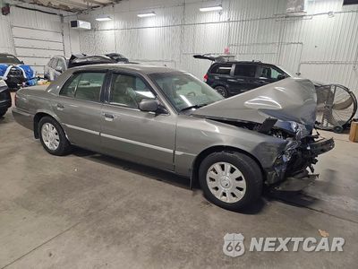 Czwarte zdjęcie samochodu z boku: 2003 MERCURY GRAND MARQUIS LS VIN:2MEFM75W63X655255 - miniatura