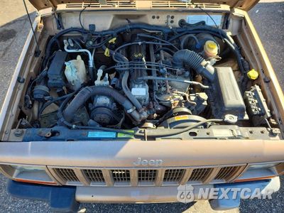 Zdjęcie 11 z 12 samochodu: 2000 JEEP CHEROKEE SPORT VIN:1J4FF48S8YL131039 - miniatura