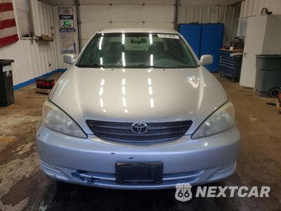 Piąte zdjęcie samochodu w środku: 2004 TOYOTA CAMRY LE VIN:4T1BE30K84U286171 - miniatura