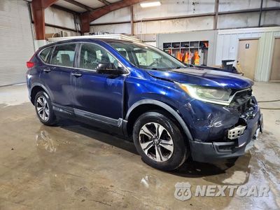 Czwarte zdjęcie samochodu z boku: 2017 HONDA CR-V LX VIN:2HKRW6H39HH211901 - miniatura
