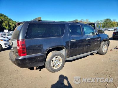 Trzecie zdjęcie samochodu z tyłu: 2010 CHEVROLET SUBURBAN K1500 LS VIN:1GNUKHE33AR215311 - miniatura