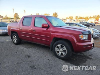 Czwarte zdjęcie samochodu z boku: 2006 HONDA RIDGELINE VIN:2HJYK16516H538504 - miniatura