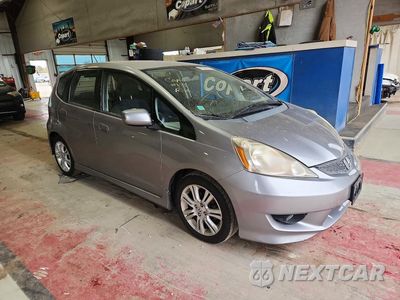 Czwarte zdjęcie samochodu z boku: 2009 HONDA FIT SPORT VIN:JHMGE88469S008674 - miniatura