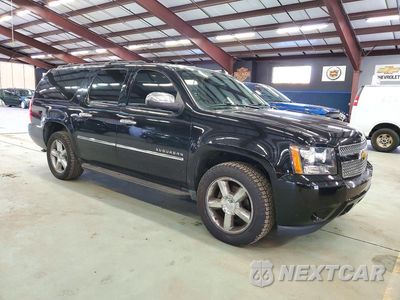 Czwarte zdjęcie samochodu z boku: 2014 CHEVROLET SUBURBAN K1500 LTZ VIN:1GNSKKE76ER128953 - miniatura
