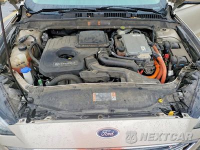 Zdjęcie 11 z 12 samochodu: 2017 FORD FUSION SE HYBRID VIN:3FA6P0LU8HR381599 - miniatura