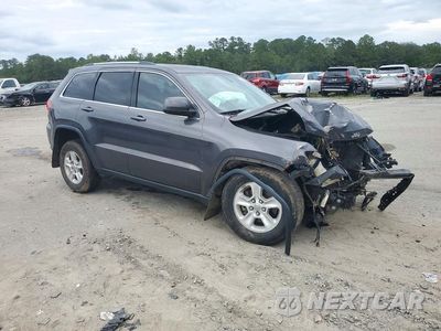 Czwarte zdjęcie samochodu z boku: 2014 JEEP GRAND CHEROKEE LAREDO VIN:1C4RJEAG1EC442417 - miniatura
