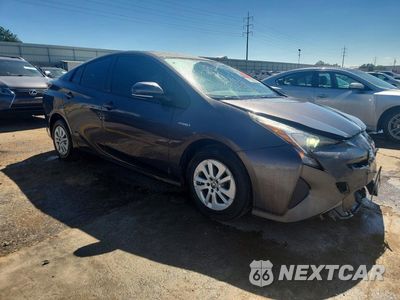 Czwarte zdjęcie samochodu z boku: 2016 TOYOTA PRIUS TWO VIN:JTDKBRFU1G3504406 - miniatura