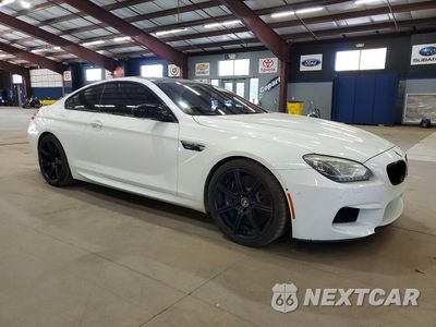 Czwarte zdjęcie samochodu z boku: 2014 BMW M6 VIN:WBSLX9C5XED160318 - miniatura