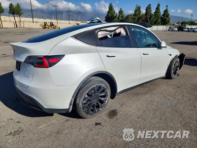 Trzecie zdjęcie samochodu z tyłu: 2021 TESLA MODEL Y VIN:5YJYGDEE1MF070866 - miniatura