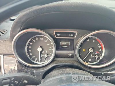 Zdjęcie 9 z 13 samochodu: 2014 MERCEDES-BENZ GL 550 4MATIC VIN:4JGDF7DE4EA386904 - miniatura