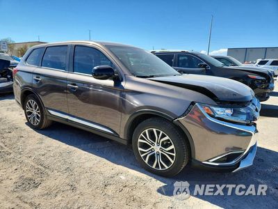 Czwarte zdjęcie samochodu z boku: 2017 MITSUBISHI OUTLANDER ES VIN:JA4AD2A38HZ041927 - miniatura