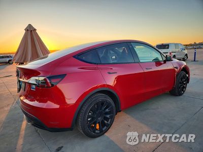 Trzecie zdjęcie samochodu z tyłu: 2023 TESLA MODEL Y VIN:7SAYGAEE4PF642485 - miniatura