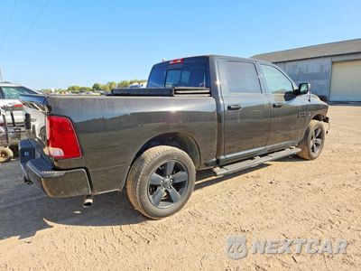 Trzecie zdjęcie samochodu z tyłu: 2018 RAM 1500 SLT VIN:1C6RR7LG8JS260318 - miniatura