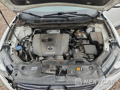 Zdjęcie 12 z 13 samochodu: 2016 MAZDA CX-5 TOURING VIN:JM3KE2CY4G0870052 - miniatura