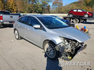 Czwarte zdjęcie samochodu z boku: 2014 FORD FOCUS TITANIUM VIN:1FADP3J24EL346854 - miniatura