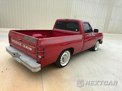 Czwarte zdjęcie samochodu z boku: 1986 DODGE D-SERIES D150 VIN:1B7FD14H6GS119397 - miniatura